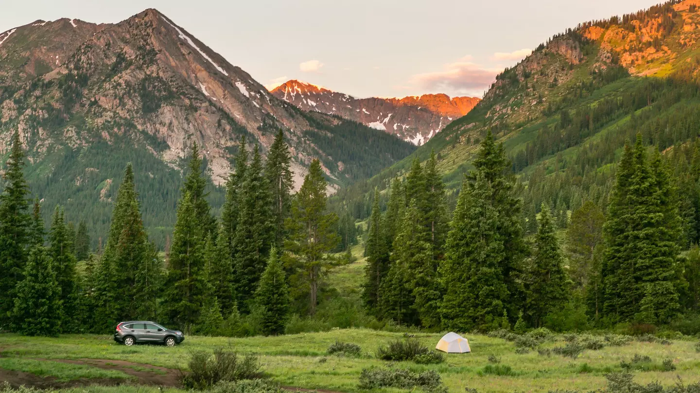 Camping in the Colorado Rockies during the month of July.