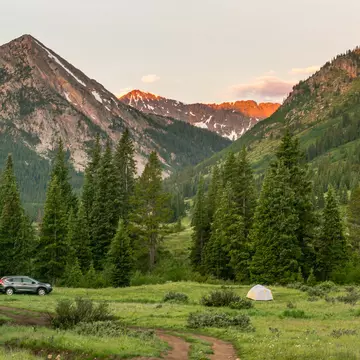 Camping in the Colorado Rockies during the month of July.