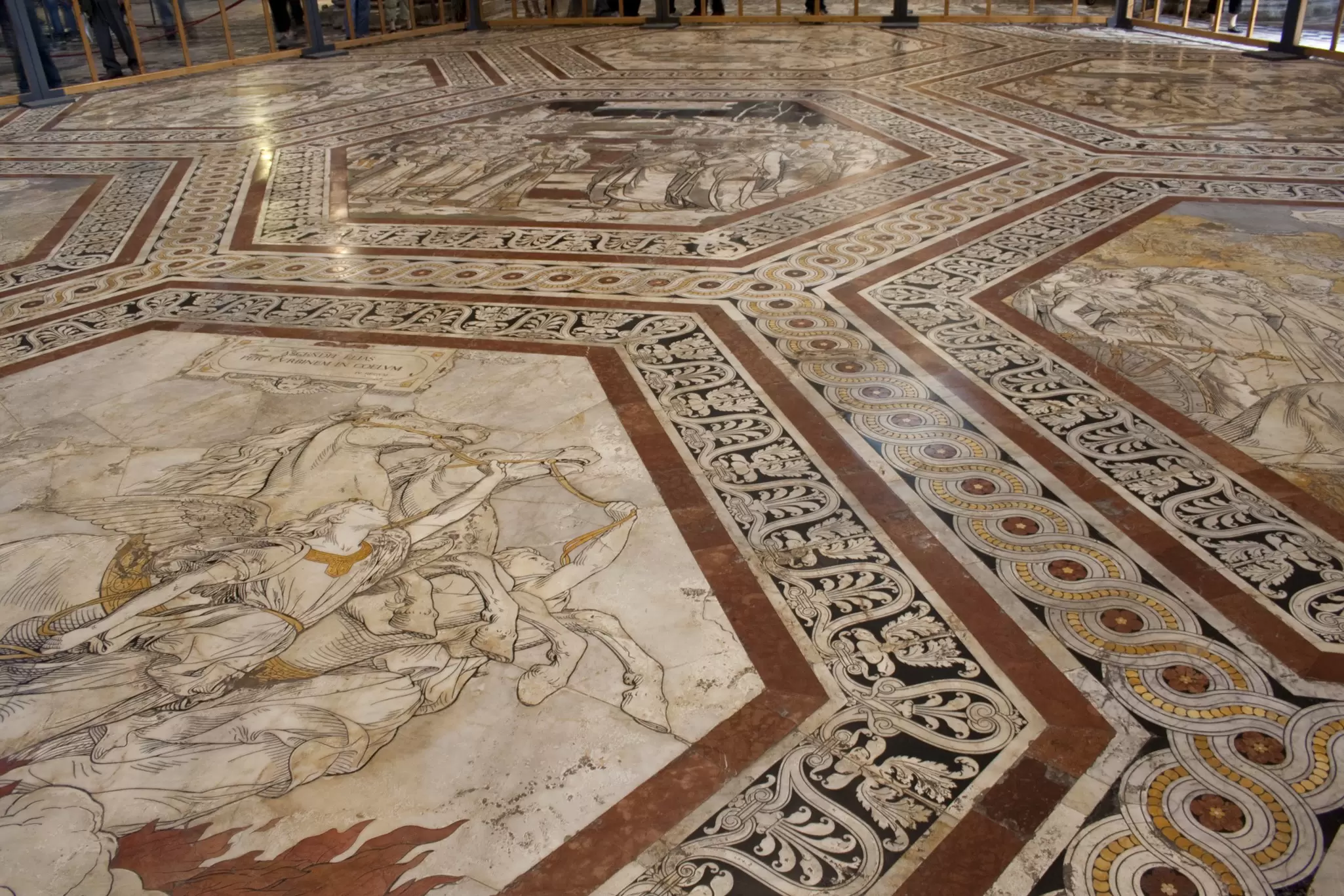 Close-up of the beautiful floor mosaics in the Siena Cathedral.