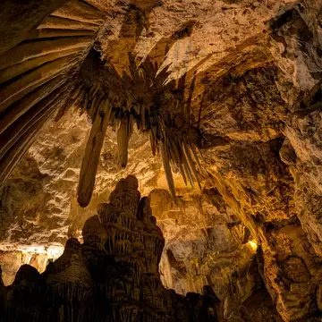 Stalactites and stalagmites in the beautiful cave of Antiparos island Cyclades, Greece