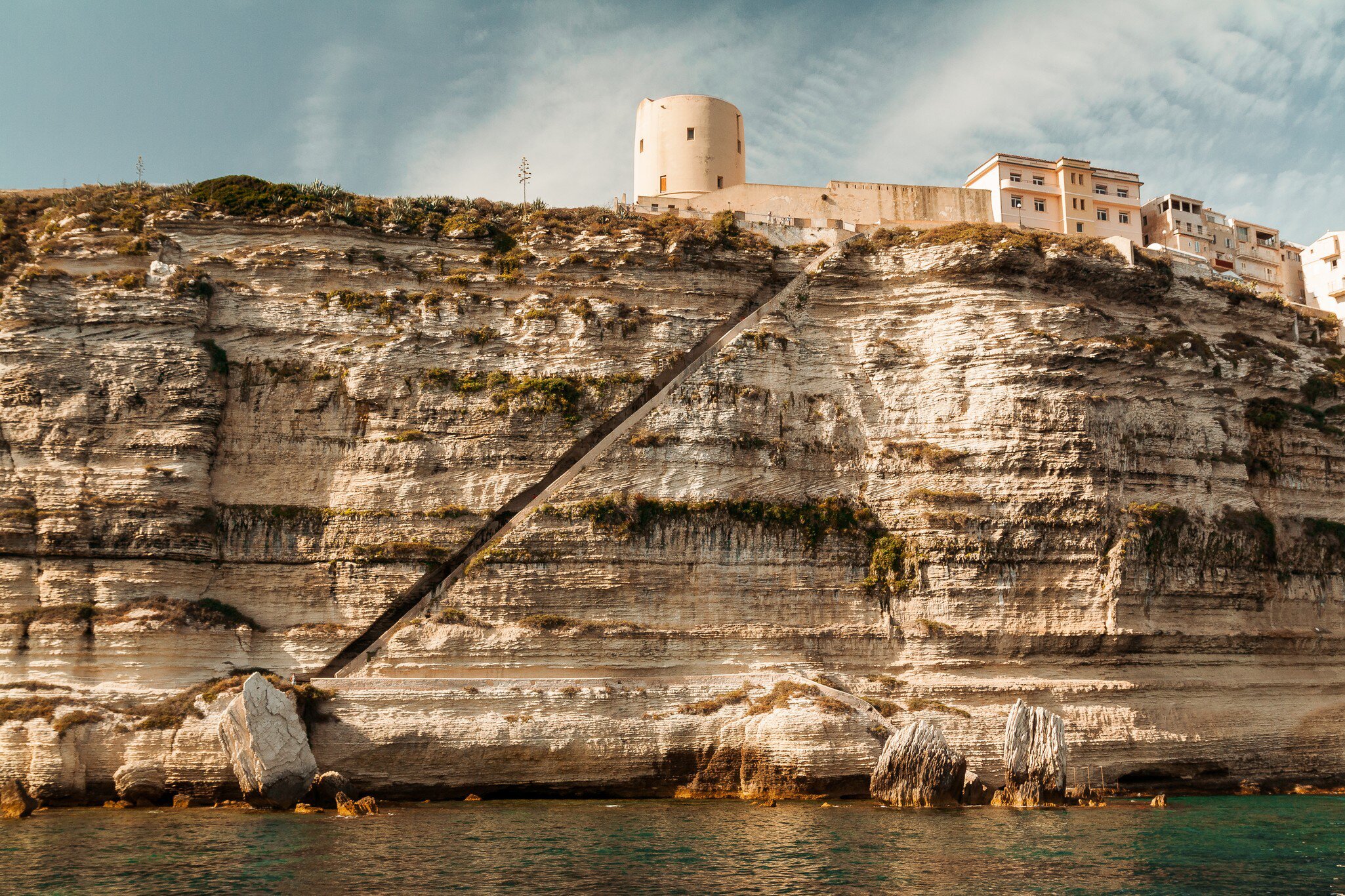 The King of Aragon’s Stairway carved into the limestone reef. Bonifacio, Corsica, France.
