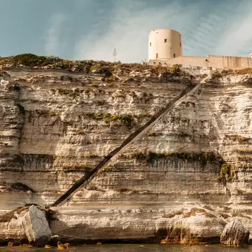 The King of Aragon’s Stairway carved into the limestone reef. Bonifacio, Corsica, France.