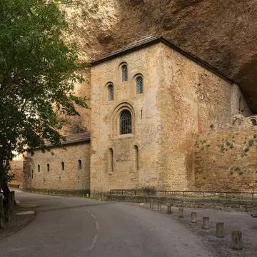 View of the Monasterio de San Juan de la Peña, partially built into the rock, in Aragón, Spain.