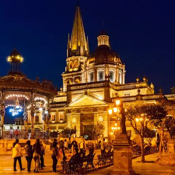 A cathedral in Guadalajara's historic center lit up at night