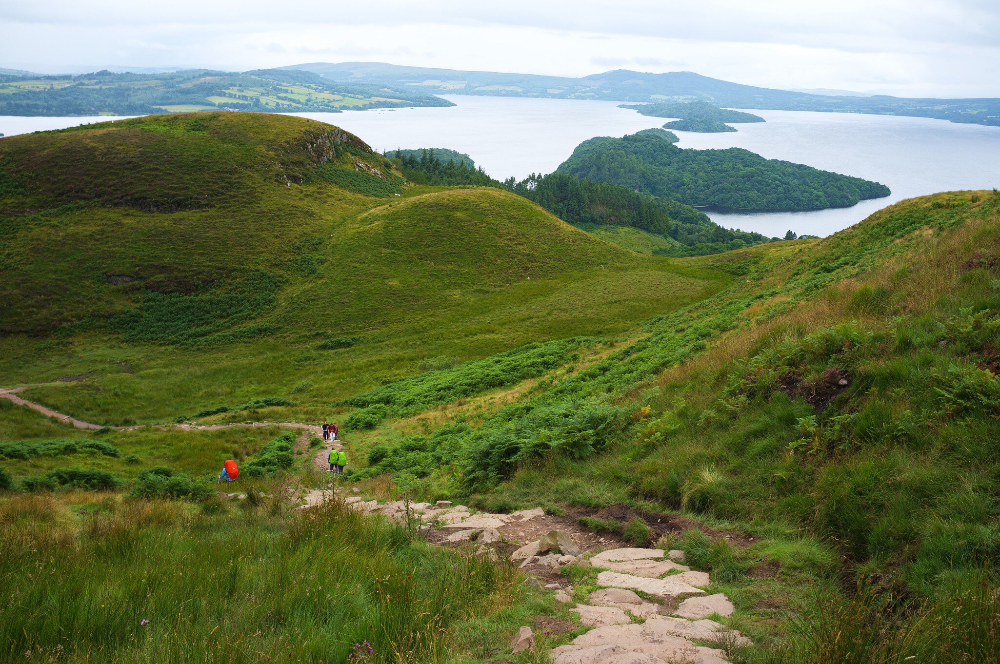 Hikers on a rocky trail near Conic Hill in Scotland.
1160165746
beautiful, blue, conic, green, highland, hike, hiking, hill, landscape, loch, lomond, mountain, nature, outdoor, people, scenic, scotland, sky, summer, tourism, travel, view, water, way, west, west highland, path