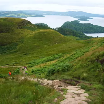 Hikers on a rocky trail near Conic Hill in Scotland.
1160165746
beautiful, blue, conic, green, highland, hike, hiking, hill, landscape, loch, lomond, mountain, nature, outdoor, people, scenic, scotland, sky, summer, tourism, travel, view, water, way, west, west highland, path