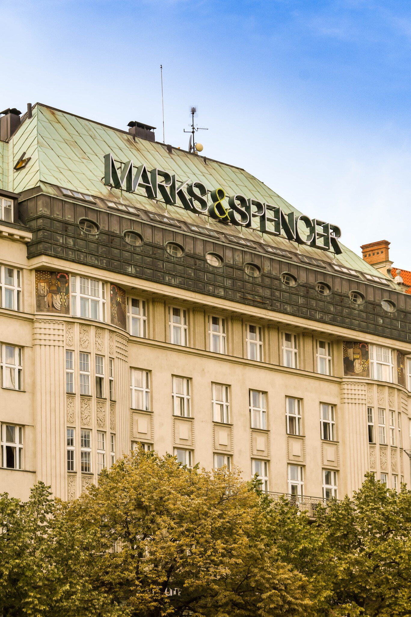 Large sign on top of the Melantrich Building housing the branch of Marks & Spencer in Prague city centre. Prague, Czech Republic. 