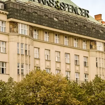 Large sign on top of the Melantrich Building housing the branch of Marks & Spencer in Prague city centre. Prague, Czech Republic. 