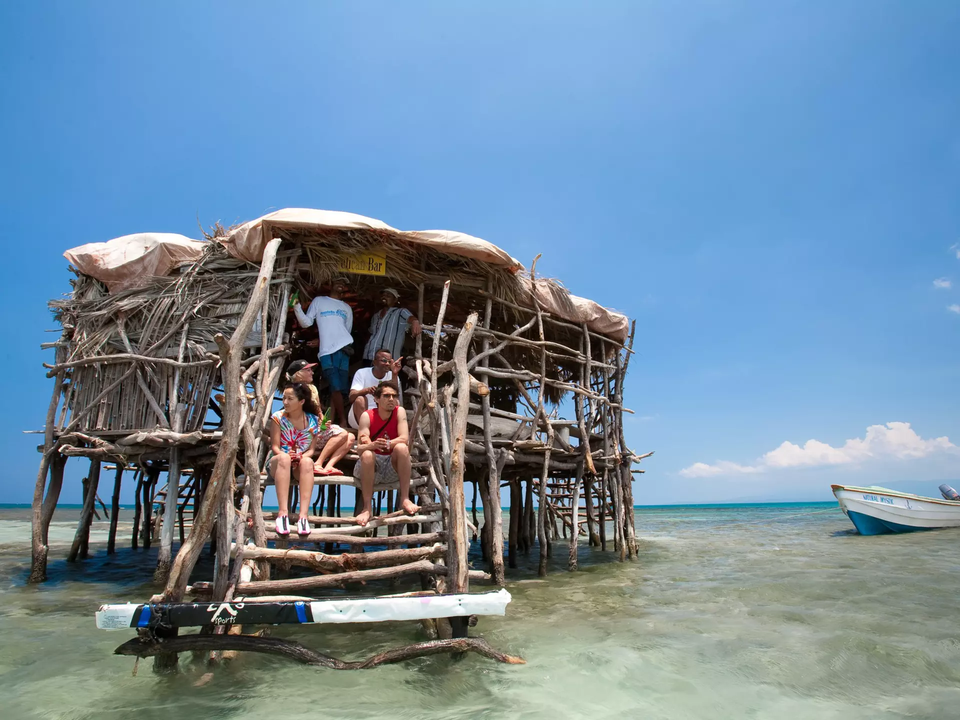 Spending time with locals and tourists at Pelican Bar is well worth a trip to Jamaica.