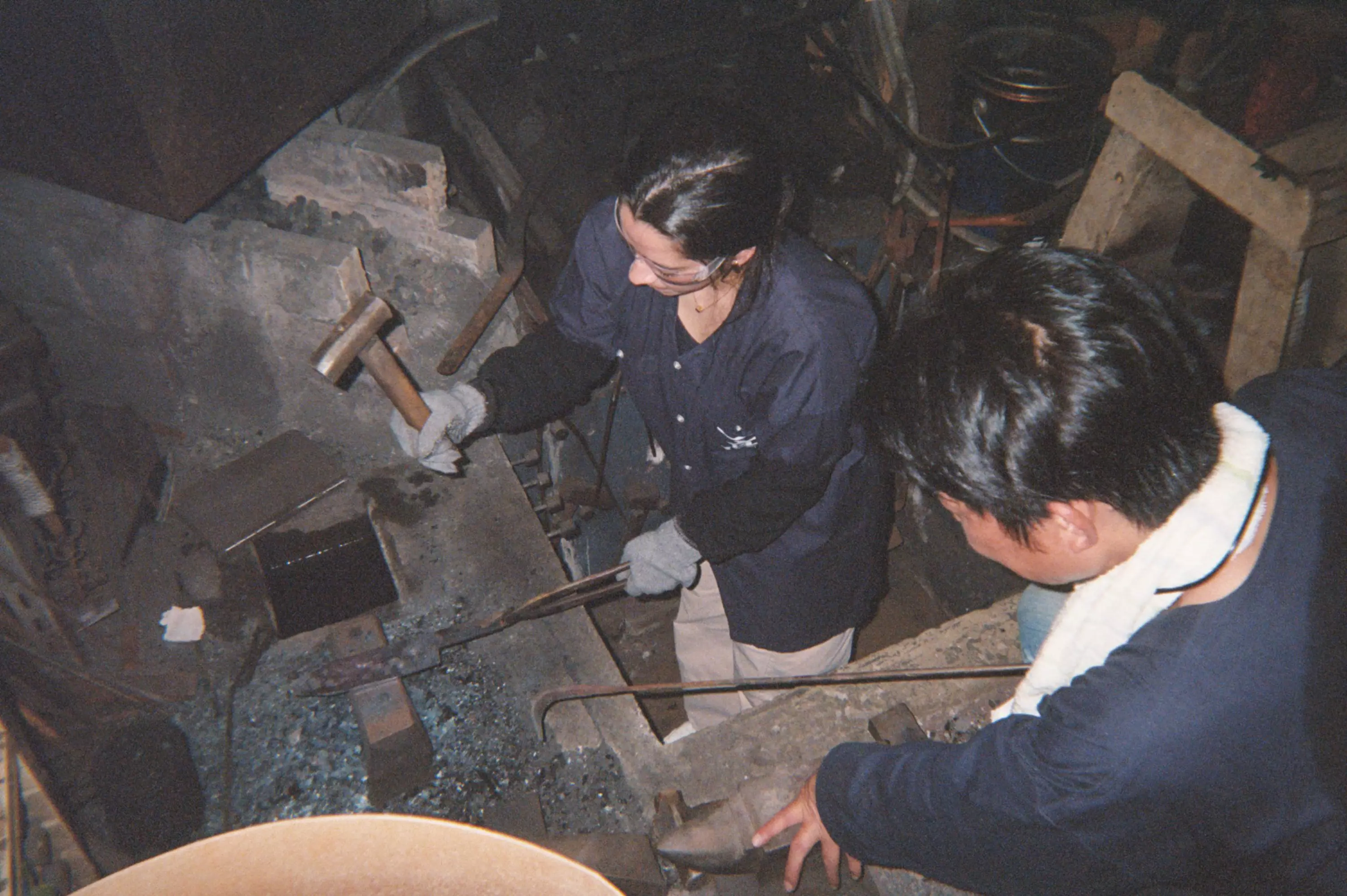 Laura Somoza learning knifemaking from a 14th-generation bladesmith in Kyoto, Japan
