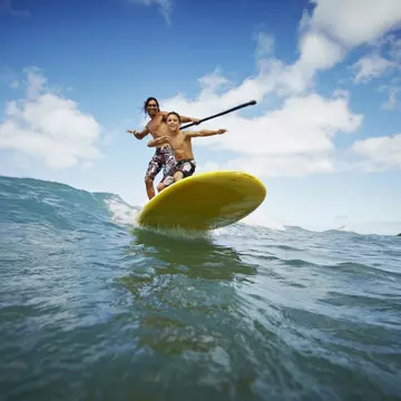 A father and son riding a wave on a paddleboard on Maui
106668640
Balance, Enjoyment, Excitement, Performance, Riding A Wave