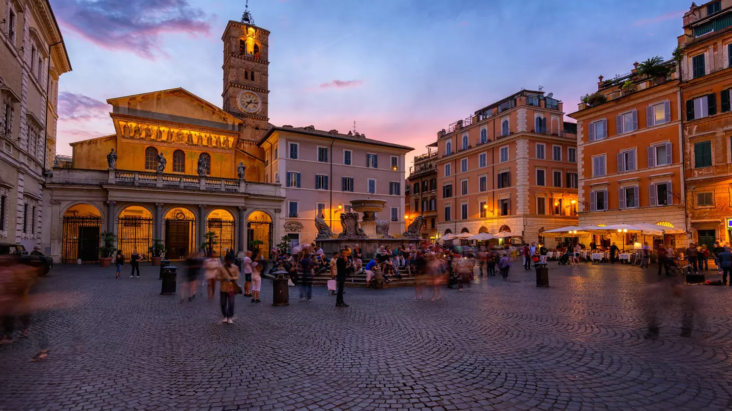 Basilica di Santa Maria in Trastevere and Piazza di Santa Maria in Trastevere at sunset