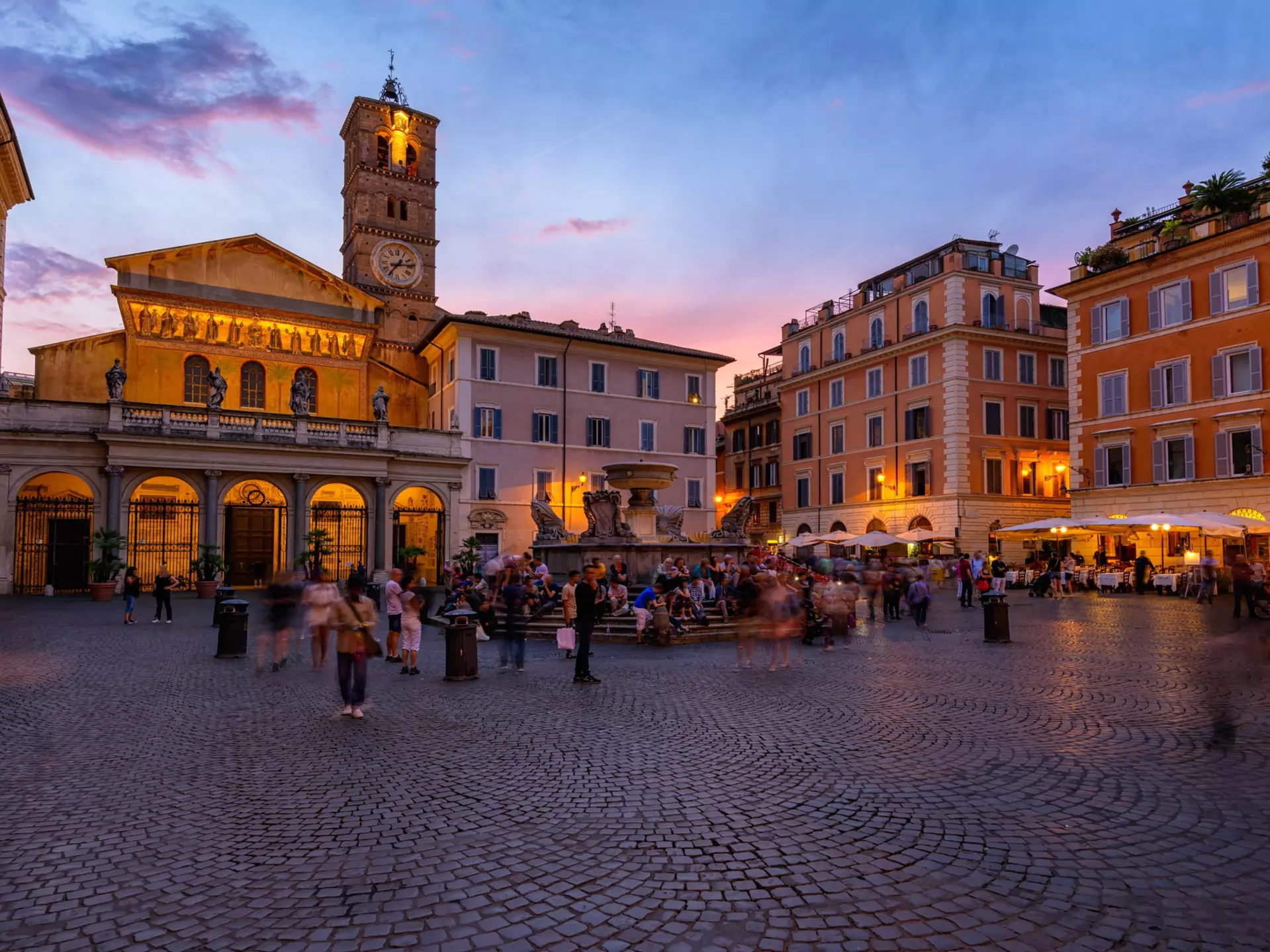 Basilica di Santa Maria in Trastevere and Piazza di Santa Maria in Trastevere at sunset