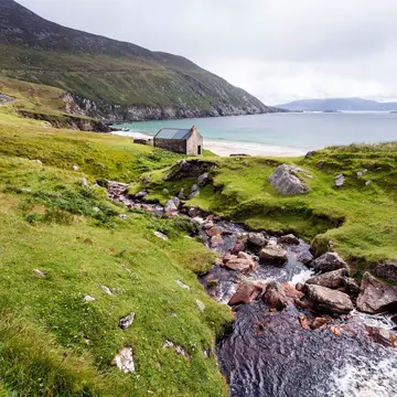 Landscape with mountains and ocean at Keem beach. Achill, Ireland
