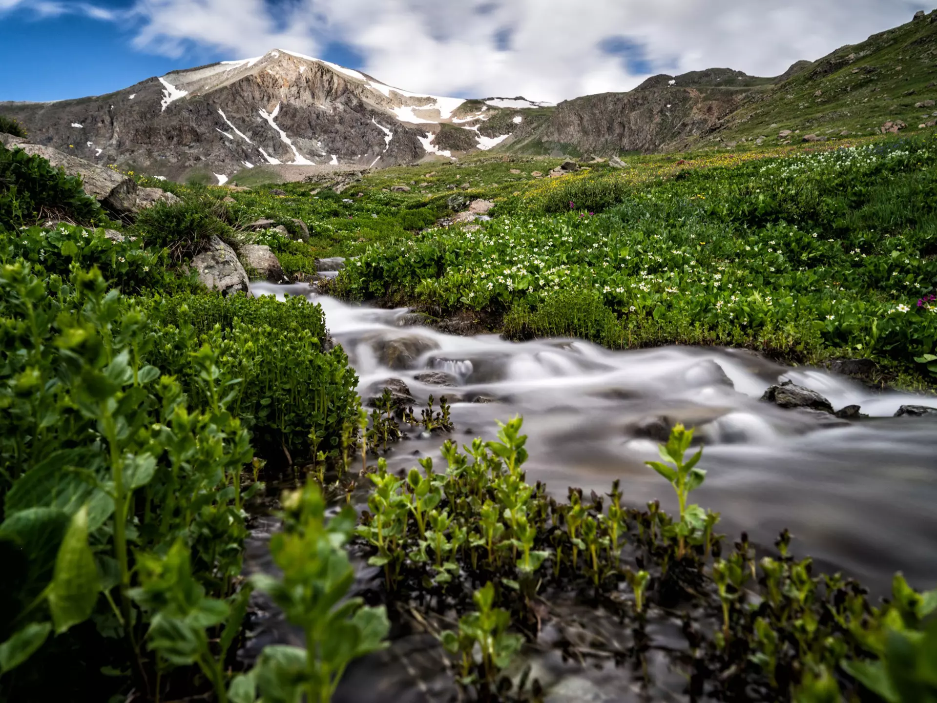 Long exposure of a stream in the San Juan Mountain Range with Handies Peak in the background.
823154036
14er, beautiful landscape, USA, River, Landscape, Landscape - Scenery, Rural Scene, Valley, Scenics - Nature, Outdoor Pursuit, Cloud - Sky, Forest, Summer, Colorado, Mountain, Mountain Peak, Mountain Climbing, Autumn, Backgrounds, Exploration, Horizontal, Summit - Meeting, Springtime, Wilderness, Climbing, Adventure, Nature, Wallpaper - Decor, Rocky Mountains - North America, Beauty, San Juan Mountains, Hiking, Camping, Photography, Flowing Water, Tranquility, No People, Cloudscape