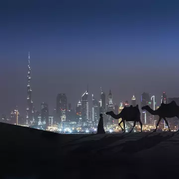 Step outside of shimmering Dubai to experience traditional Bedouin culture. Buena Vista Images / Getty Images