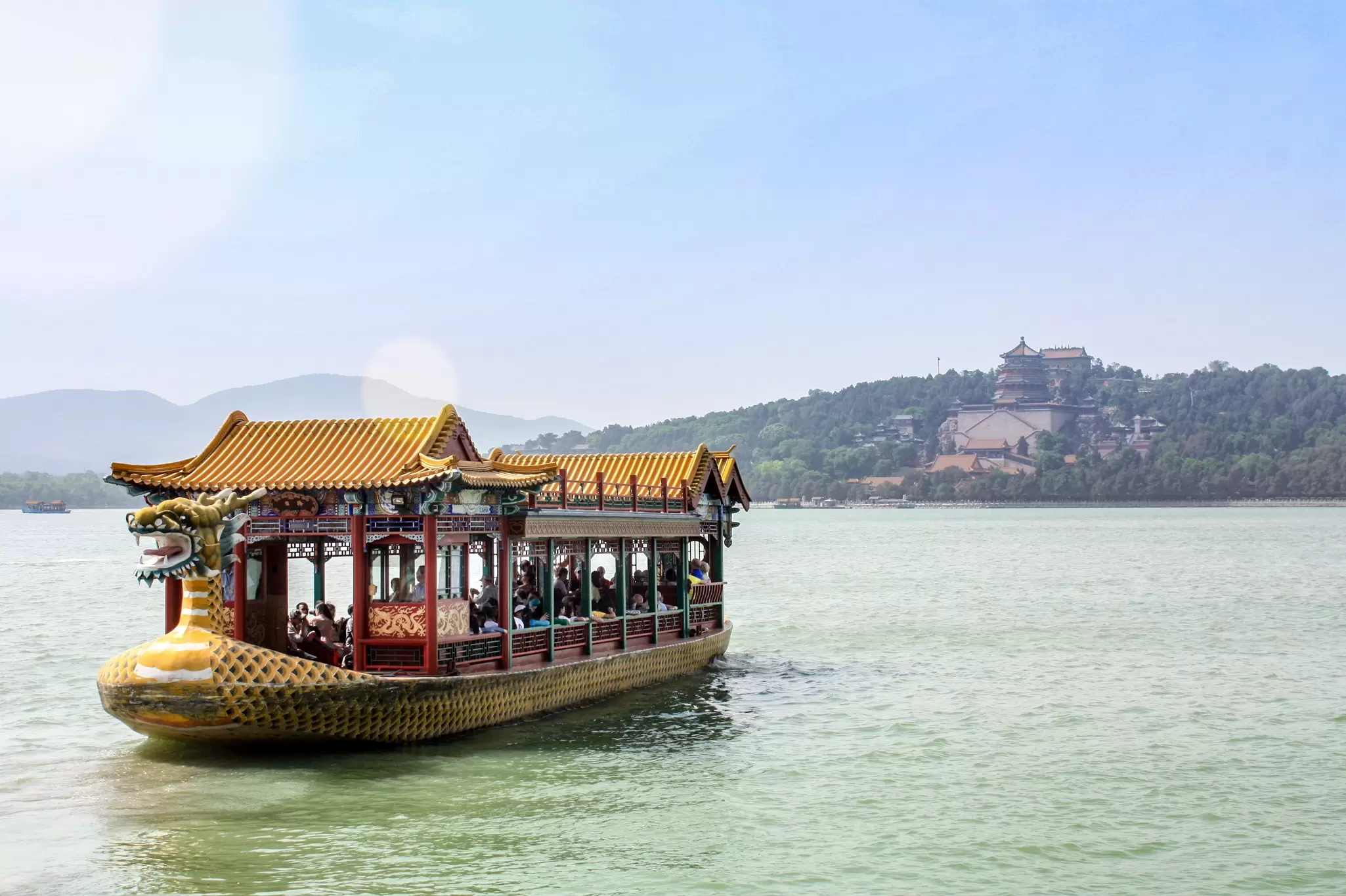 View of a colorful boat on Kunming Lake at the Summer Palace in Beijing, China.