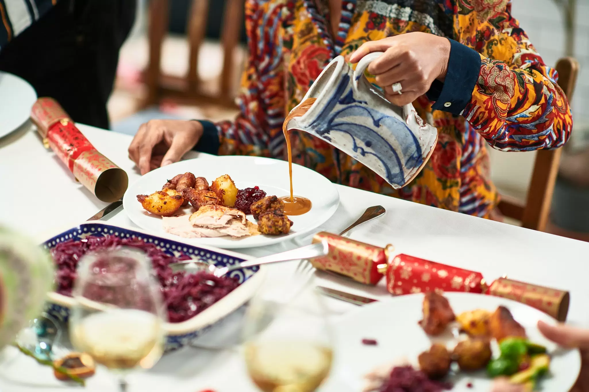 Tuck into turkey and countless side dishes during Christmas dinner in the UK. Getty Images