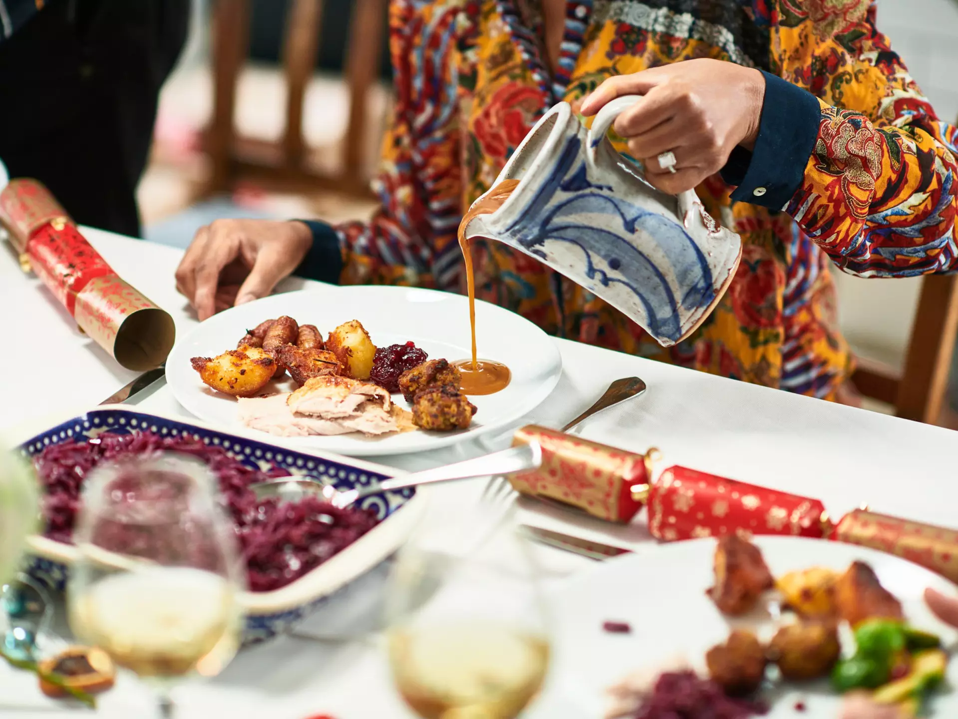 Tuck into turkey and countless side dishes during Christmas dinner in the UK. Getty Images