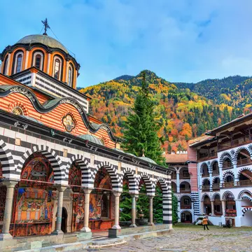 Exterior of the Orthodox Rila Monastery in the Rila Nature Park.
1160109394
ancient, architecture, attraction, autumn, beautiful, blue, building, bulgaria, church, city, clouds, courtyard, culture, destination, europe, exterior, facade, fall, famous, heritage, historic, history, journey, landmark, medieval, monastery, monument, mountains, national, national park, october, old, orthodox, park, religion, religious, rila, rila monastery, rila nature park, sky, structure, tourism, tourist, town, travel, unesco, vacation, vibrant, visit