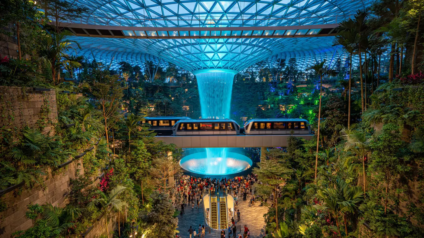 Check out these innovative sustainable attractions worldwide, like the Jewel at Changi Airport. Travel man / Shutterstock