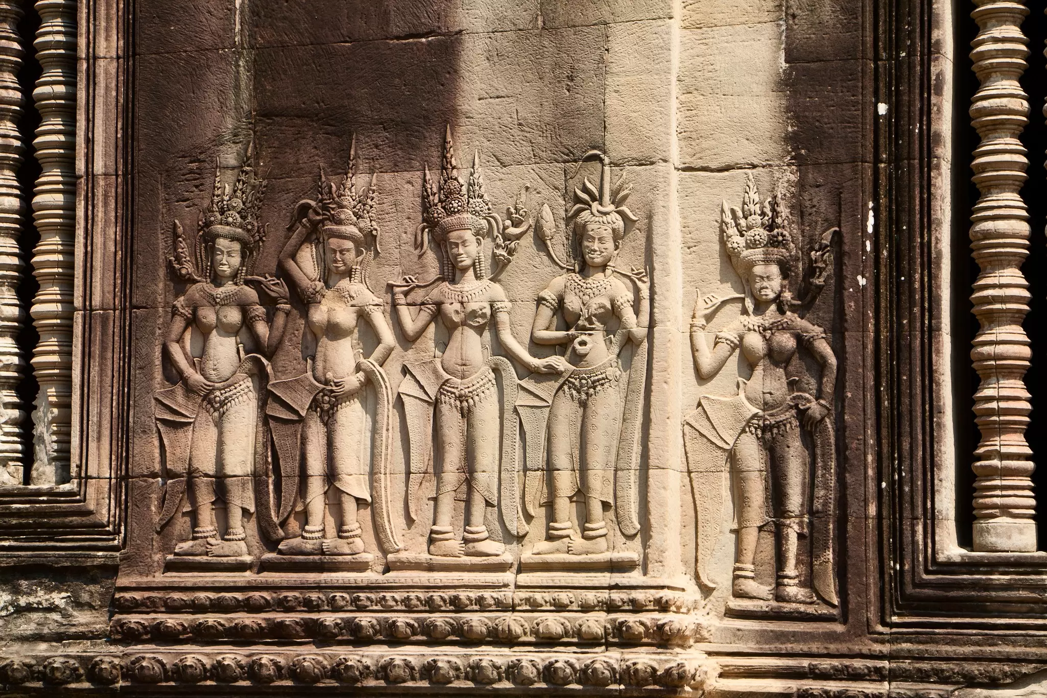 Stone carvings in the temple of Angkor Wat, Cambodia. Yulia_B/Shutterstock