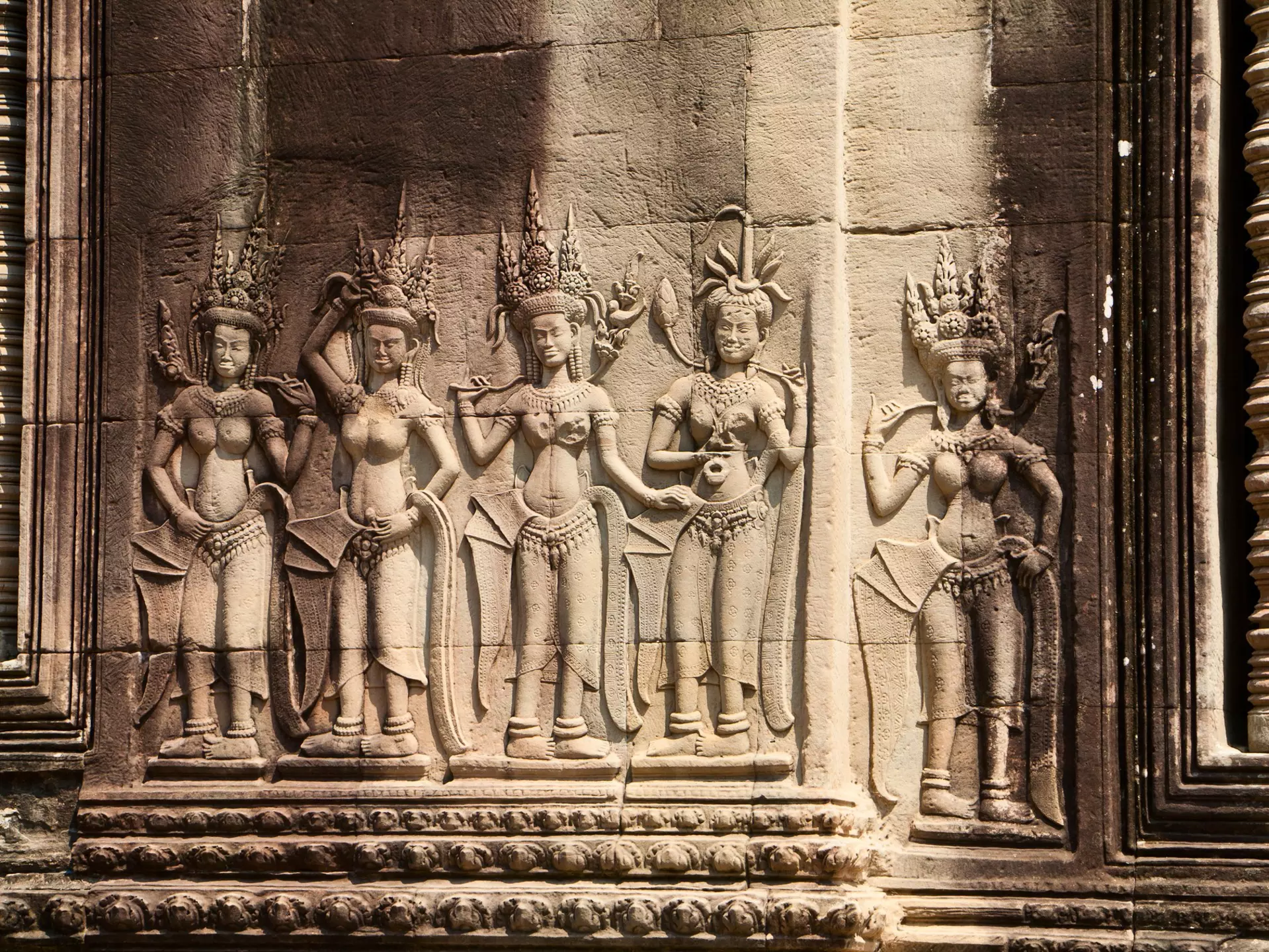 Stone carvings in the temple of Angkor Wat, Cambodia. Yulia_B/Shutterstock