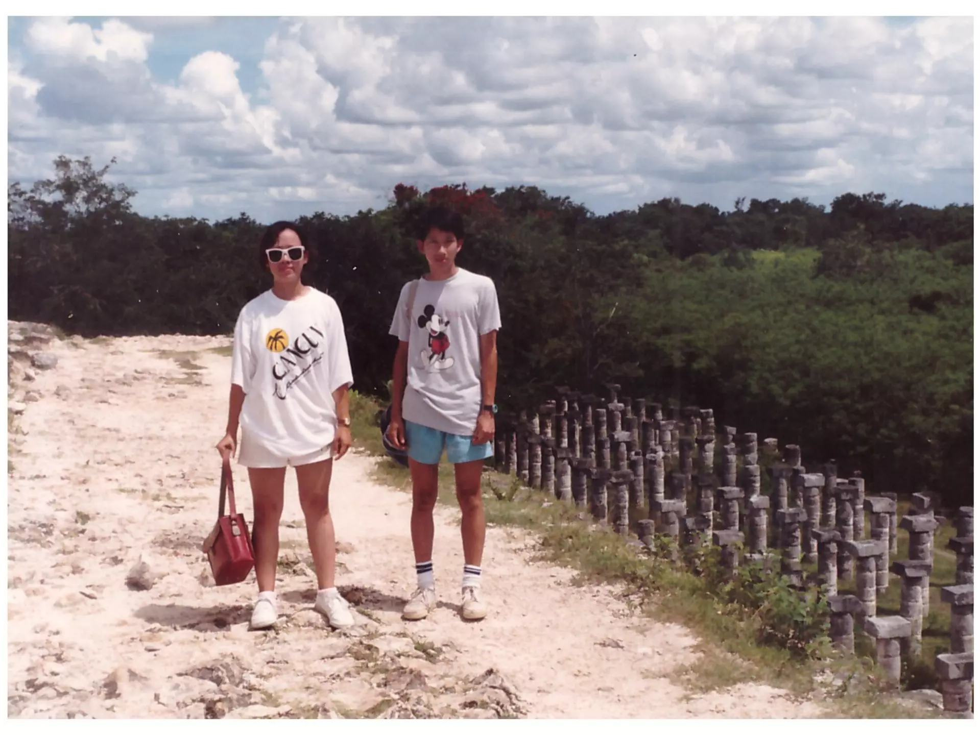 Destination Editor James Pham at Chichén Itzá with his sister. James Pham/Lonely Planet