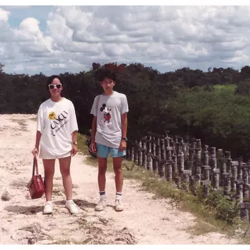 Destination Editor James Pham at Chichén Itzá with his sister. James Pham/Lonely Planet