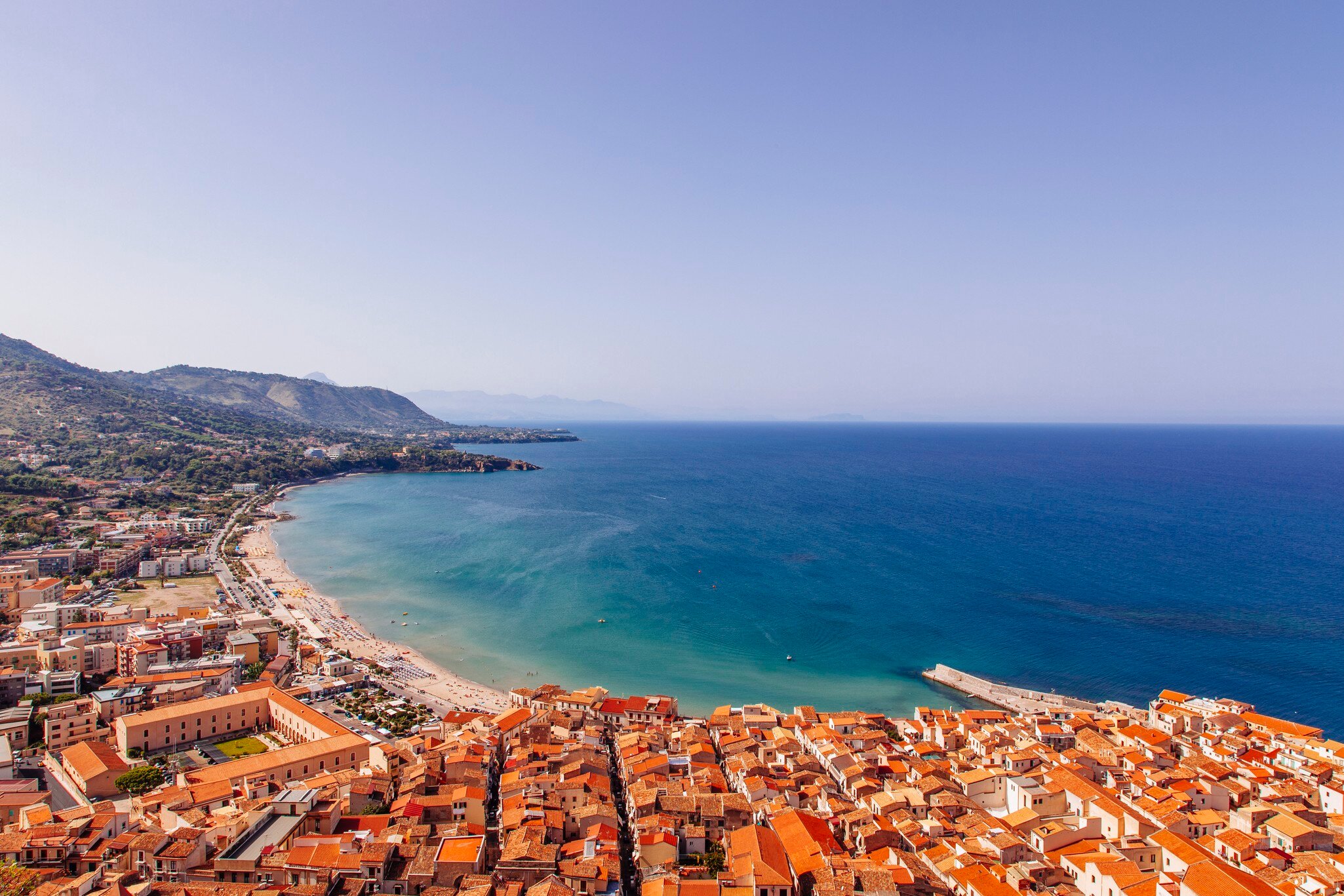View of coastline and town of Cefalu, Sicily, Italy