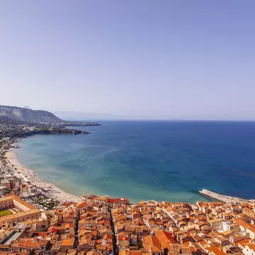 View of coastline and town of Cefalu, Sicily, Italy