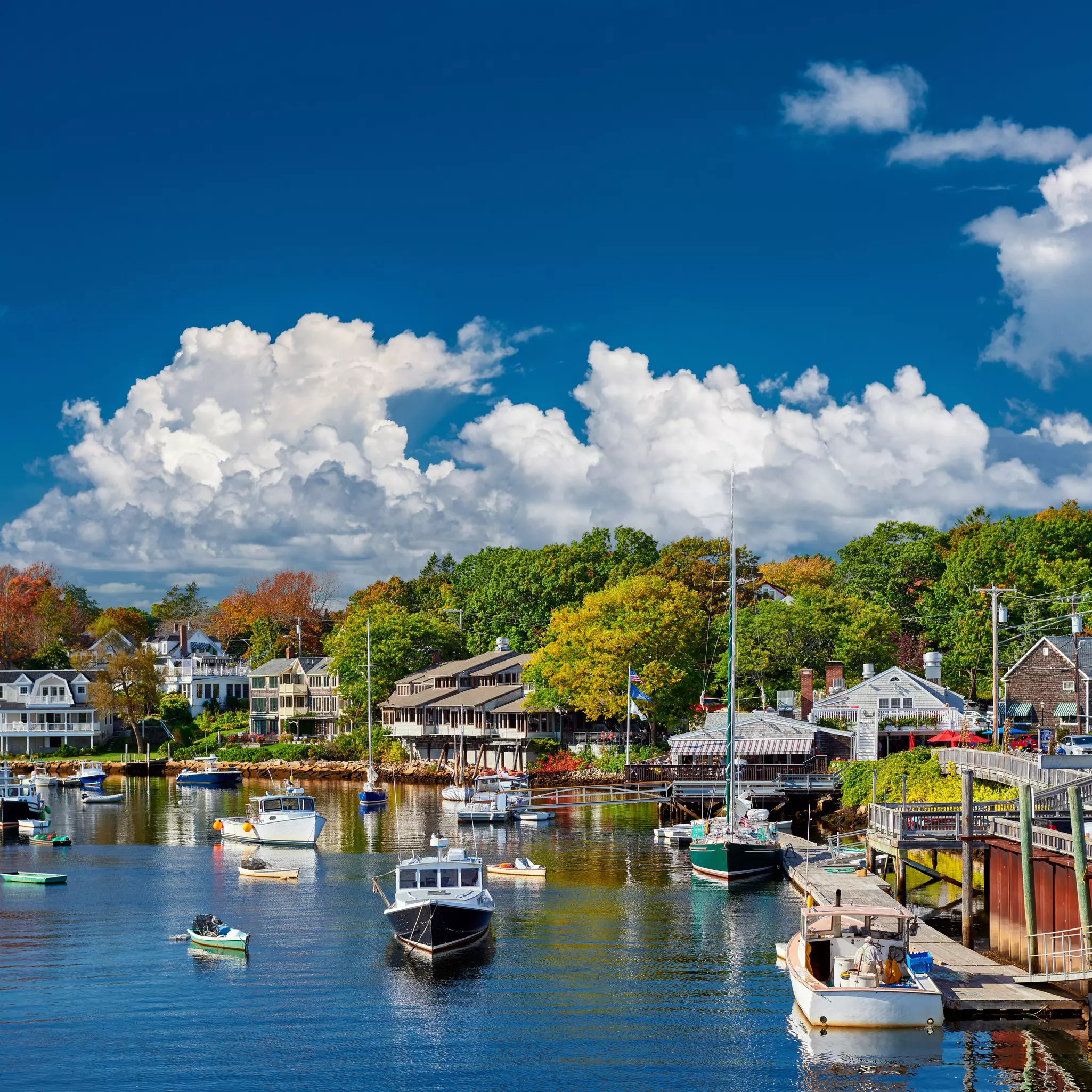 Fishing boats docked in Perkins Cove, Ogunquit, on coast of Maine south of Portland.