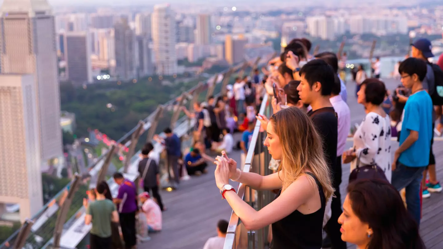 A cocktail atop Singapore's Marina Bay Sands building is worth the eye-watering drinks prices. 2p2play / Shutterstock