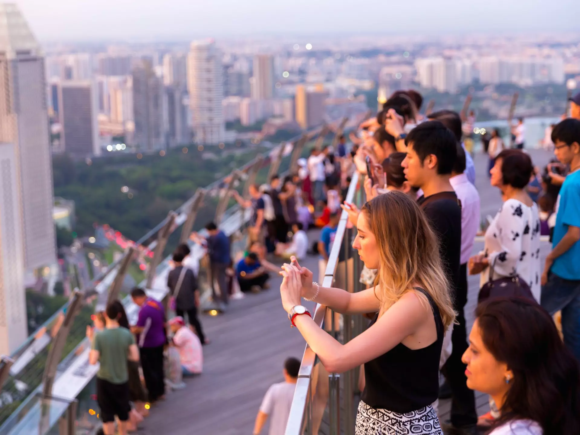 A cocktail atop Singapore's Marina Bay Sands building is worth the eye-watering drinks prices. 2p2play / Shutterstock