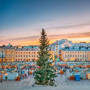 View over the Christmas Market on Senate Square in Helsinki, Finland, during sunset.