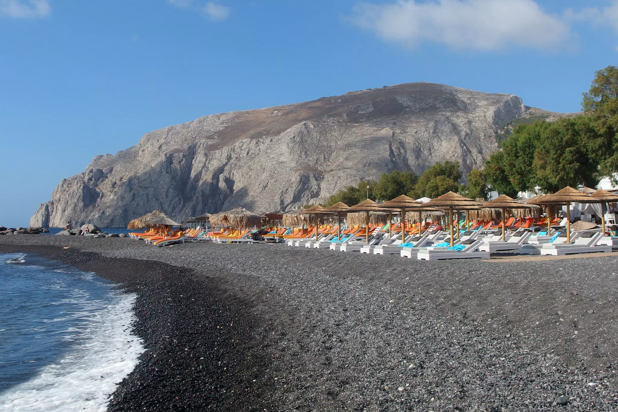 The volcanic beach in Kamari on Santorini island.