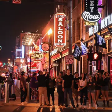 Neon signs along Lower Broadway in Nashville at night. Erika Cristina Manno/Shutterstock