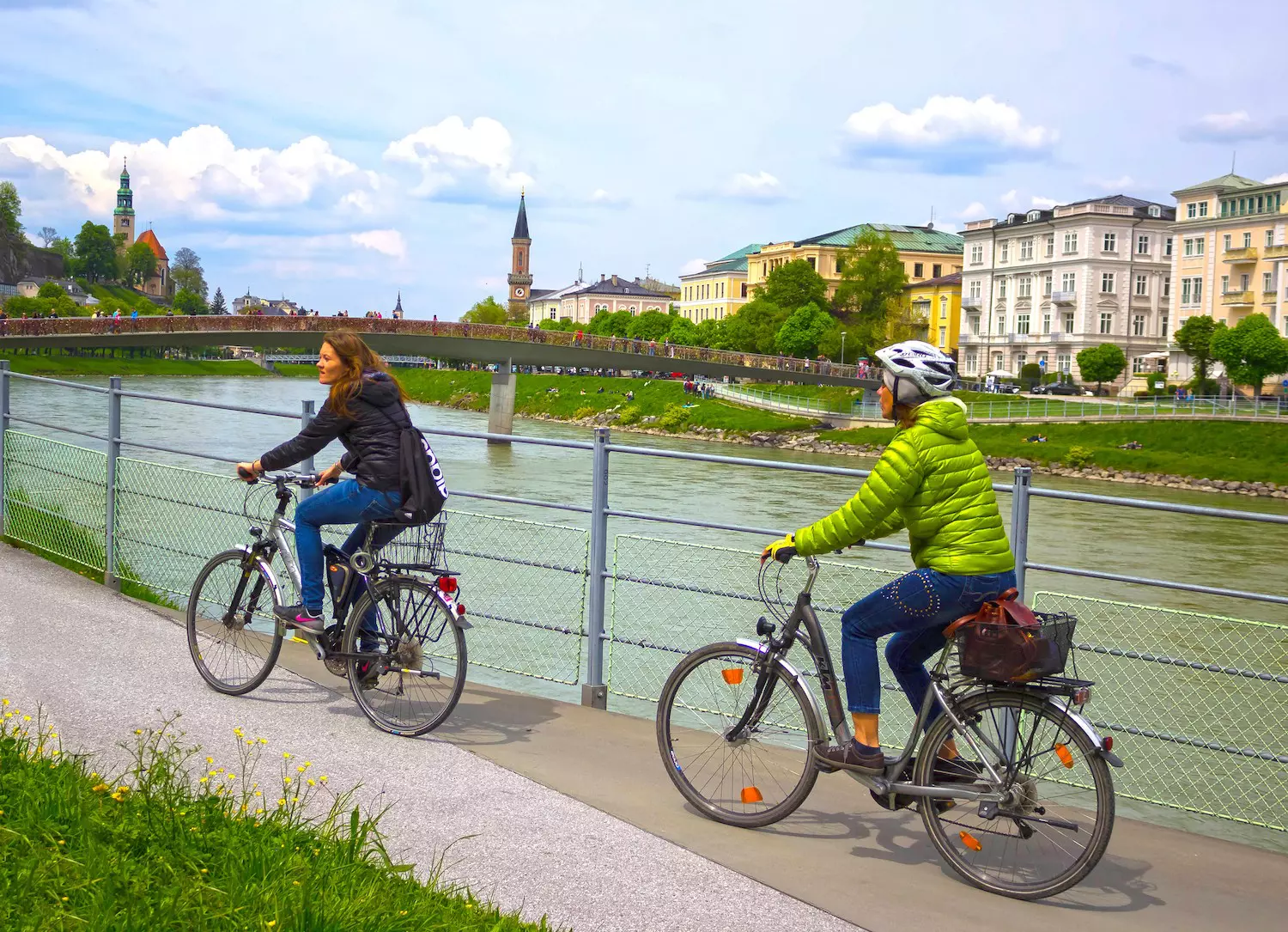 Cyclist on the embankment in Salzburg
