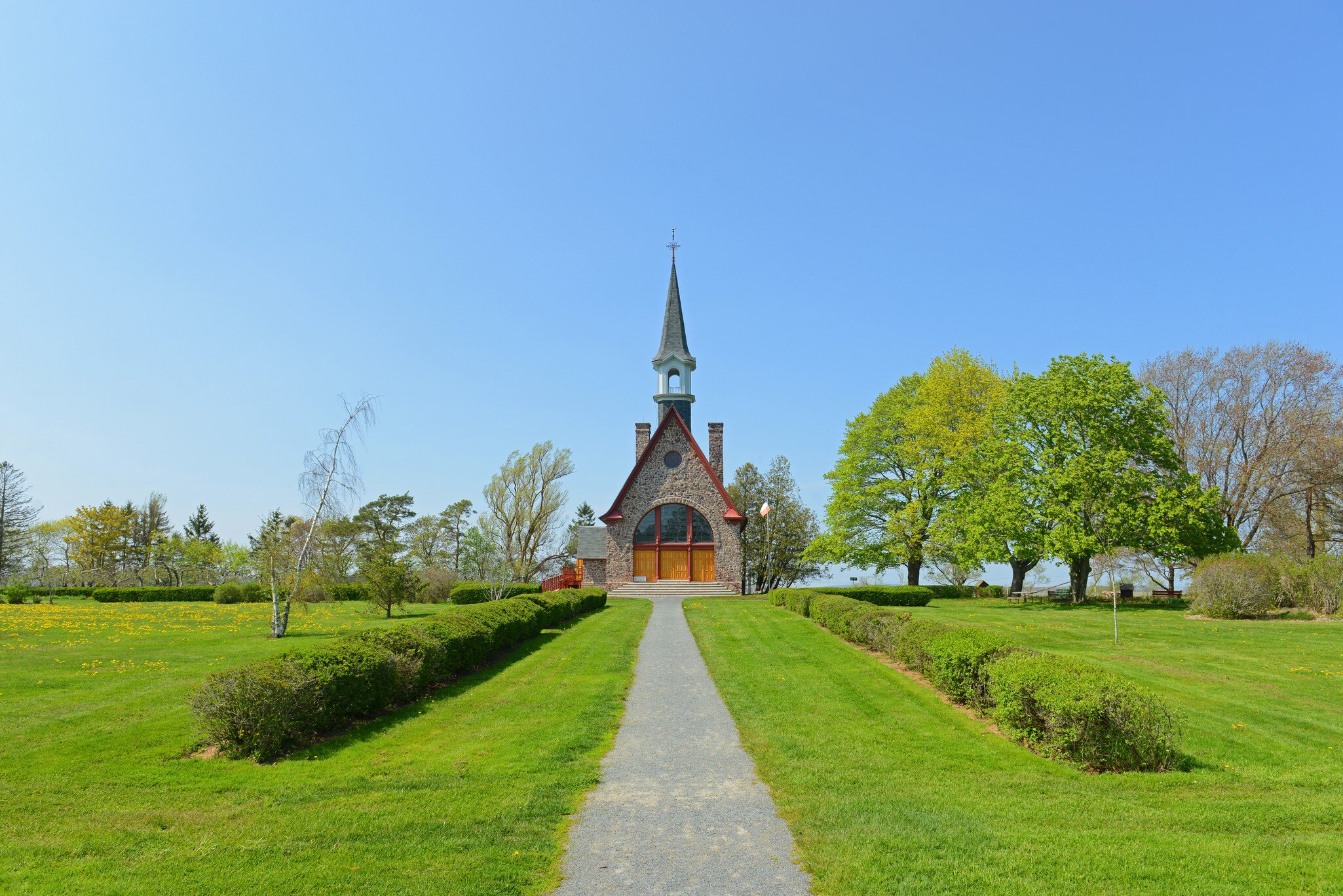 Memorial Church in Grand Pre National Historic Site, Wolfville, Nova Scotia, Canada. Grand-Pré area is a center of Acadian settlement from 1682 to 1755. Now this site is a UNESCO World Heritage Site., License Type: media, Download Time: 2025-12-03T21:02:16.000Z, User: mvm_lonelyplanet, Editorial: false, purchase_order: 56530 - Guidebooks, job: Global Publishing-WIP, client: Experience Canada 1, other: Virginia Moreno