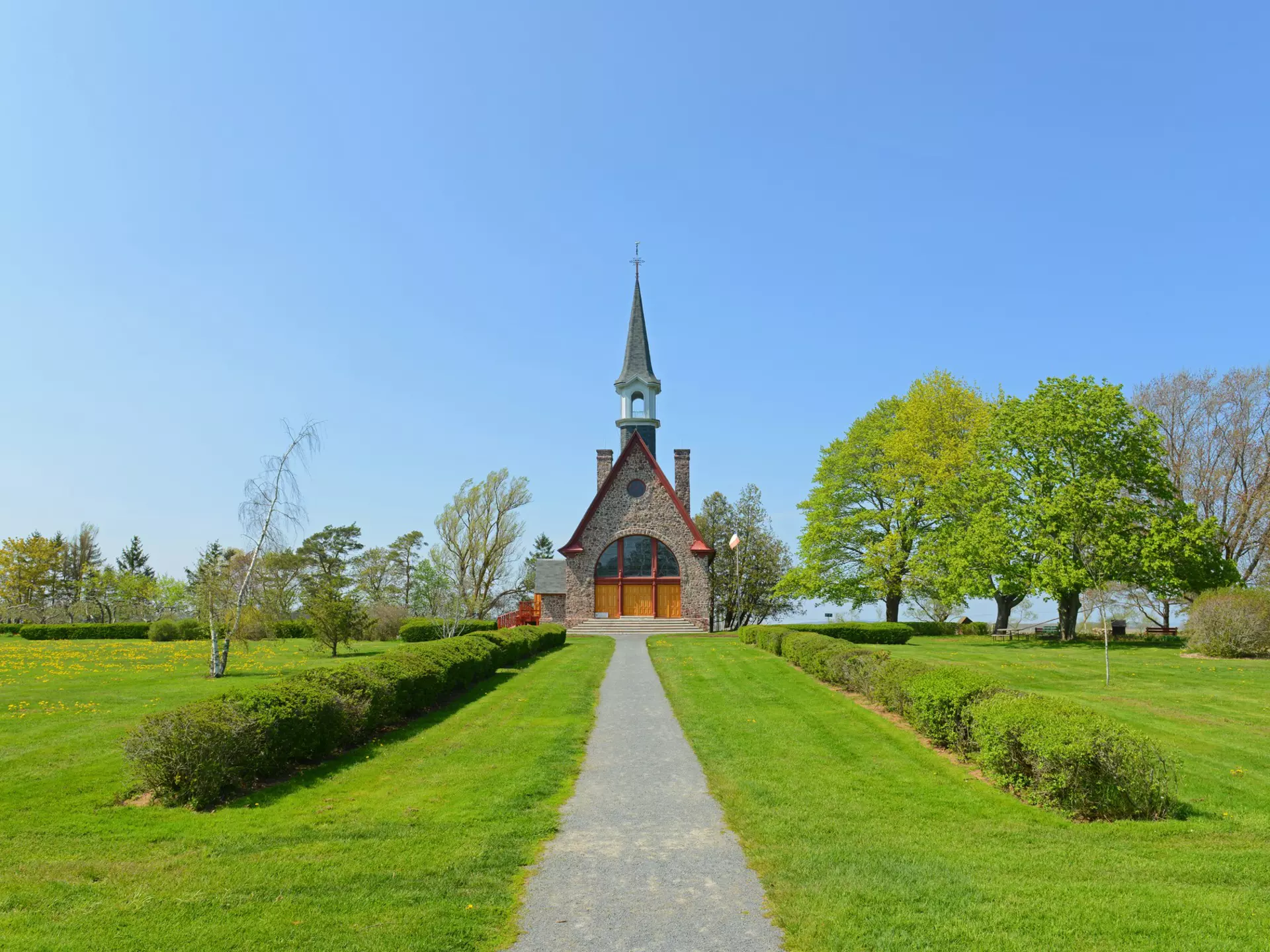 Memorial Church in Grand Pre National Historic Site, Wolfville, Nova Scotia, Canada. Grand-Pré area is a center of Acadian settlement from 1682 to 1755. Now this site is a UNESCO World Heritage Site., License Type: media, Download Time: 2025-12-03T21:02:16.000Z, User: mvm_lonelyplanet, Editorial: false, purchase_order: 56530 - Guidebooks, job: Global Publishing-WIP, client: Experience Canada 1, other: Virginia Moreno