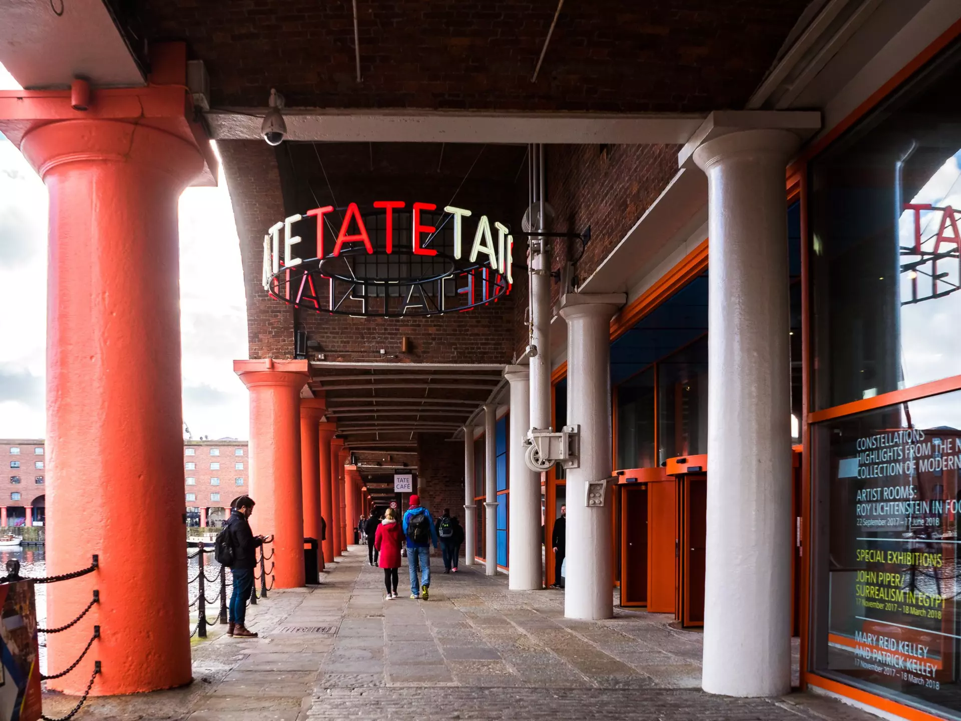People walking into the Tate Liverpool art gallery in England
