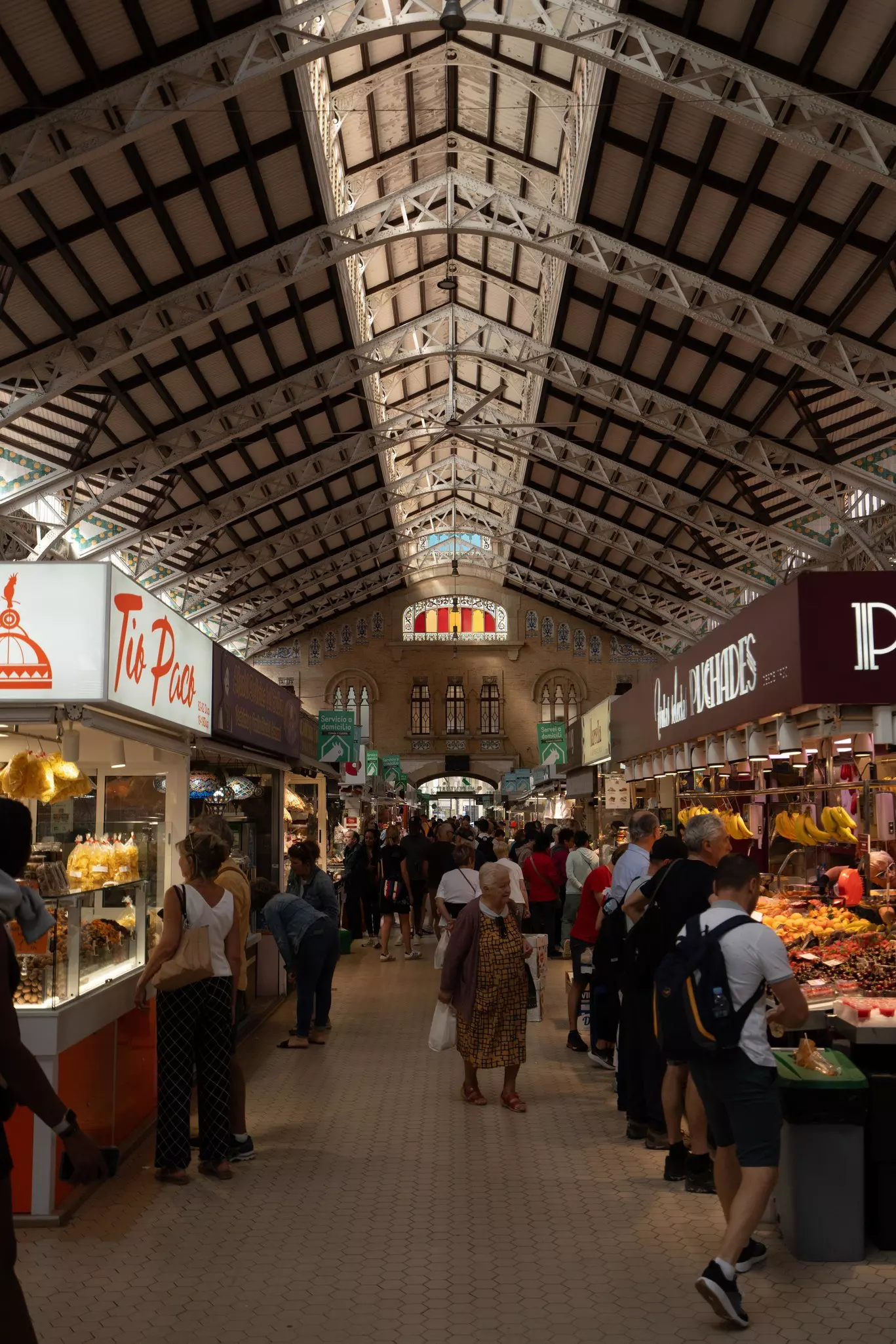 vendors selling goods in Mercado Central in Valencia, Spain. 