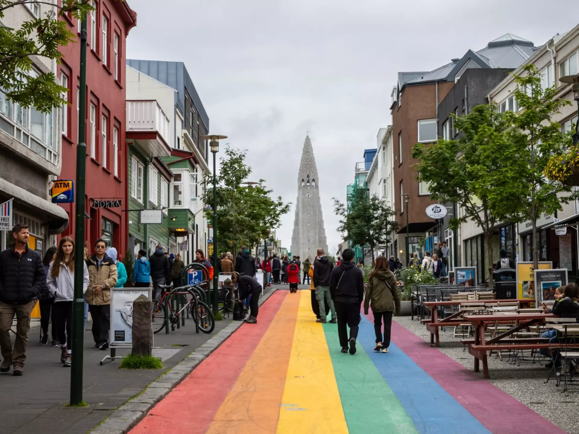 Reykjavik, Iceland - August 8, 2024: Tourists walking along the famous rainbow road in Reykjavik. , License Type: media, Download Time: 2025-12-09T22:31:57.000Z, User: Norma.PrauseBrewer_LonelyPlanet, Editorial: true, purchase_order: 56530 - Guidebooks, job: Global Publishing WIP, client: Europe 5, other: Norma Brewer