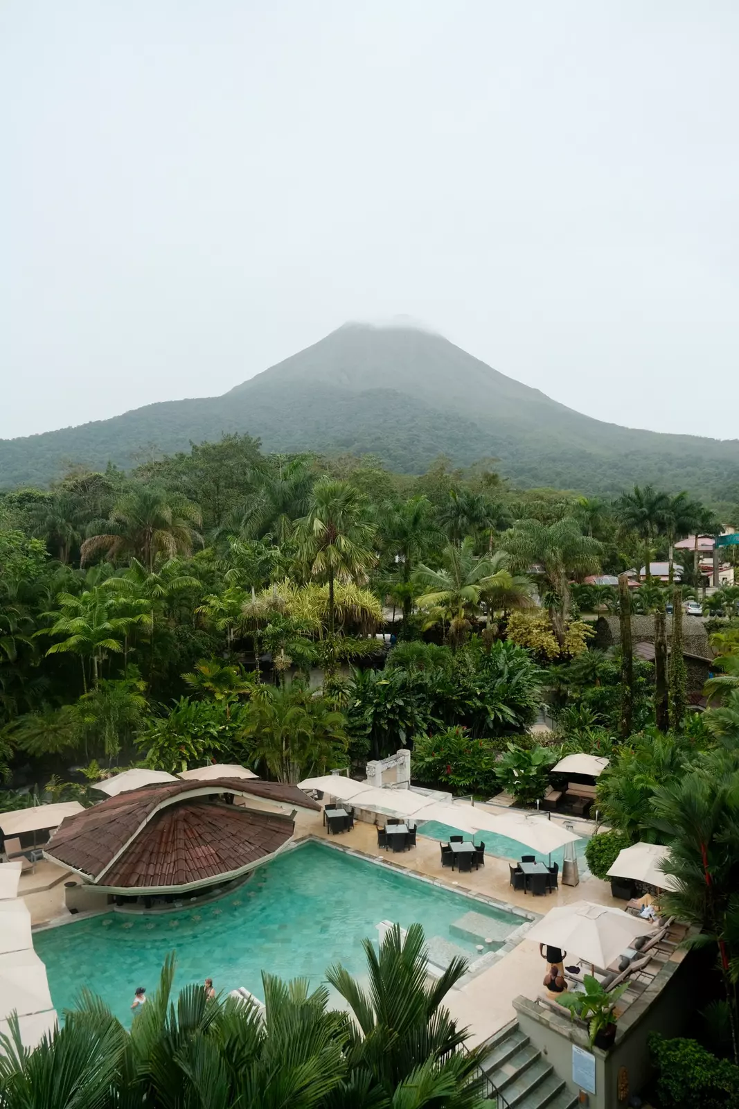 ADL press trip to Costa Rica
Views of Volcan Arenal from a guestroom balcony at the Royal Corin Hotel in La Fortuna, with the property's natural springs below