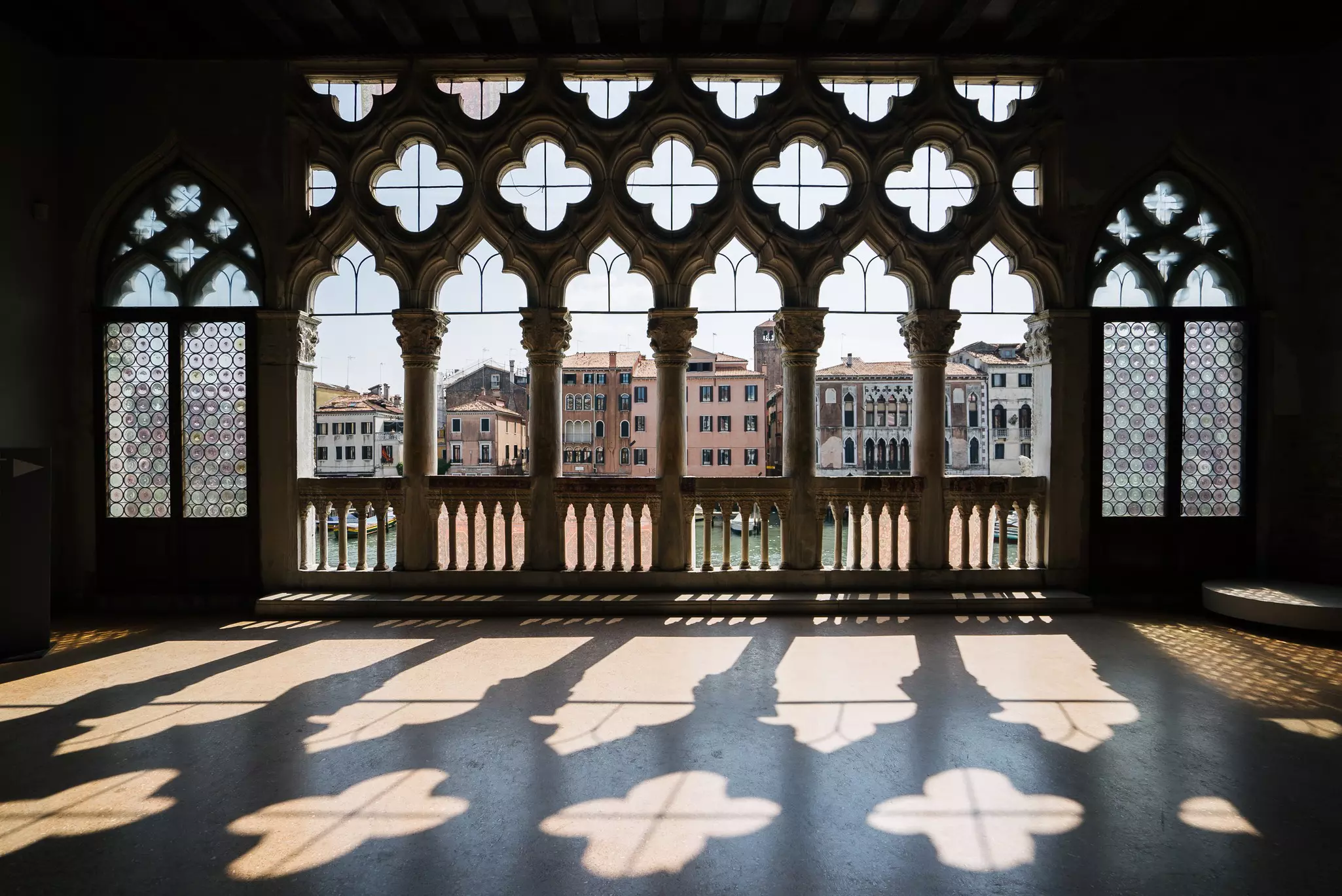 The Grand Canal and buildings view from the balcony of the Gothic Ca' d'Oro, Venice, Italy