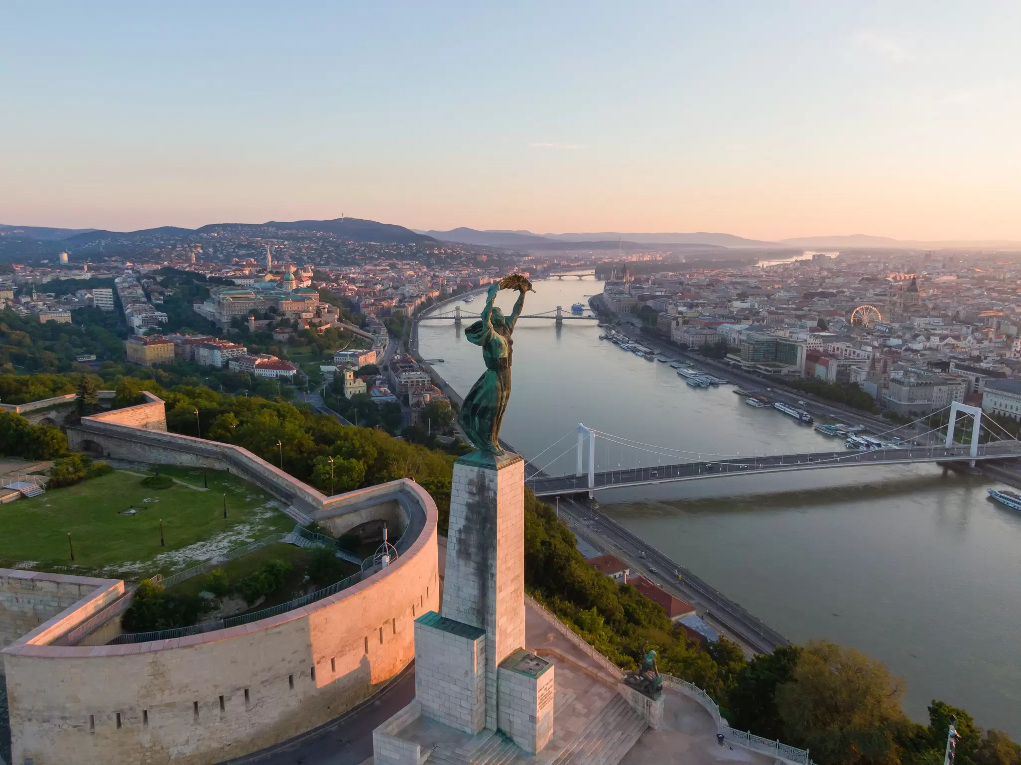 Aerial view of the Liberty Monument on Gellért Hill, with the Citadel in the background in Budapest, Hungary.