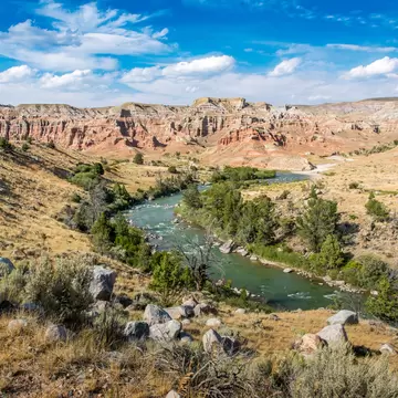 The Wind River twists through a green canyon near Dubois, Wyoming. 