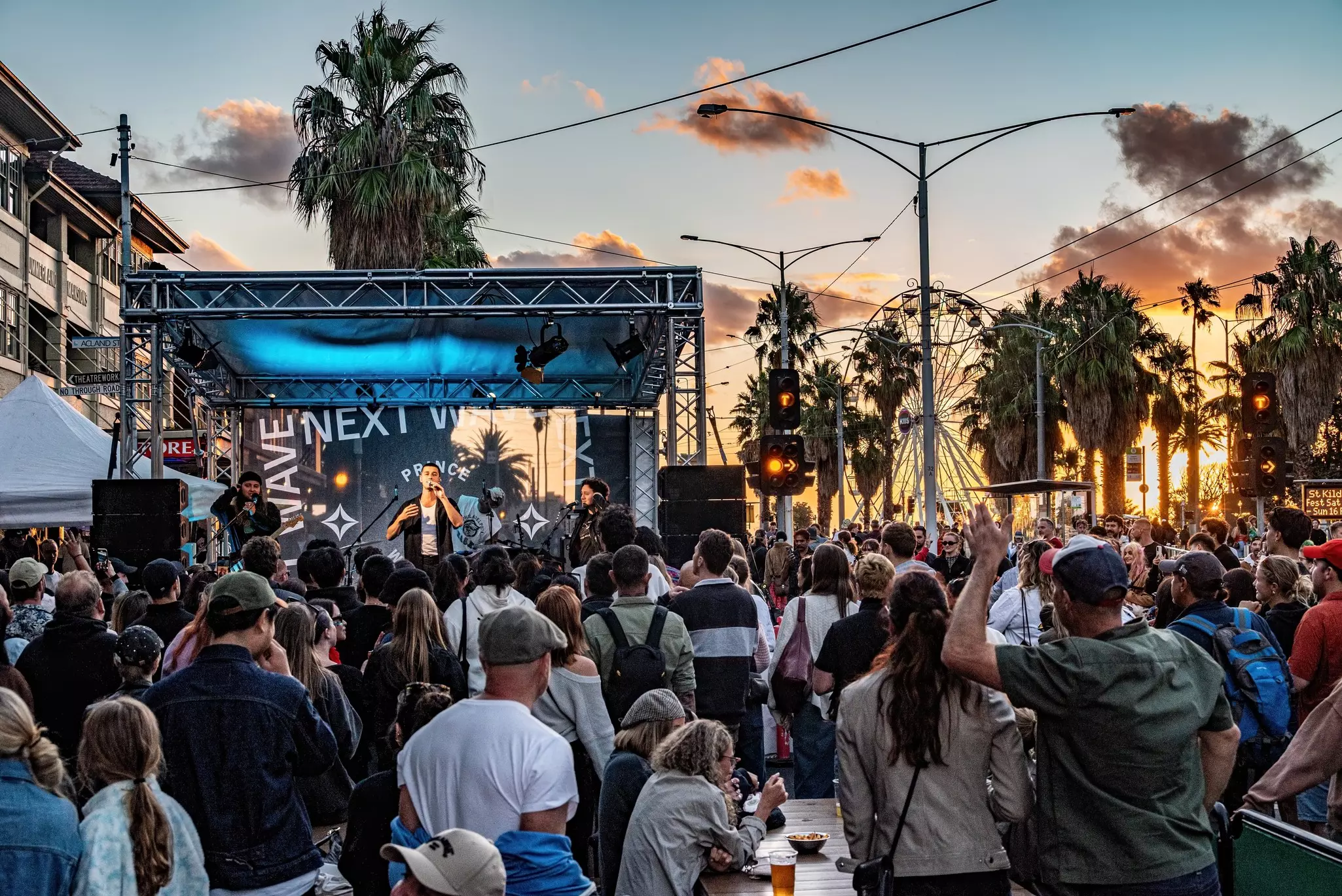  People watching a live band on Fitzroy St during the annual St Kilda Festival, a free music festival in the Melbourne bayside suburb.,