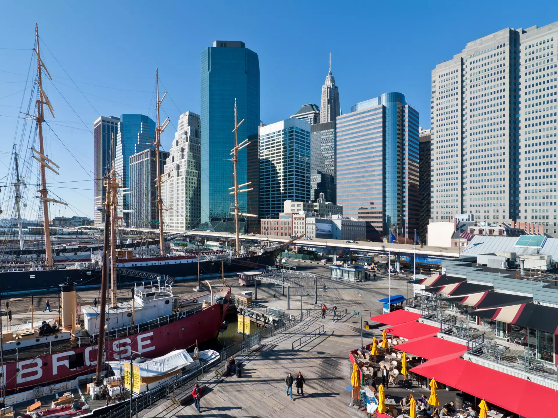 NEW YORK CITY, USA - NOVEMBER 18: People walk in Landmark seaport located next to Wall Street and financial center on a sunny day at November 18, 2011, NYC. , License Type: media, Download Time: 2025-11-26T20:58:49.000Z, User: LP_YKhanna, Editorial: true, purchase_order: 65050 - Digital Destinations and Articles, job: LP, client: App Content, other: Yuvraj Khanna