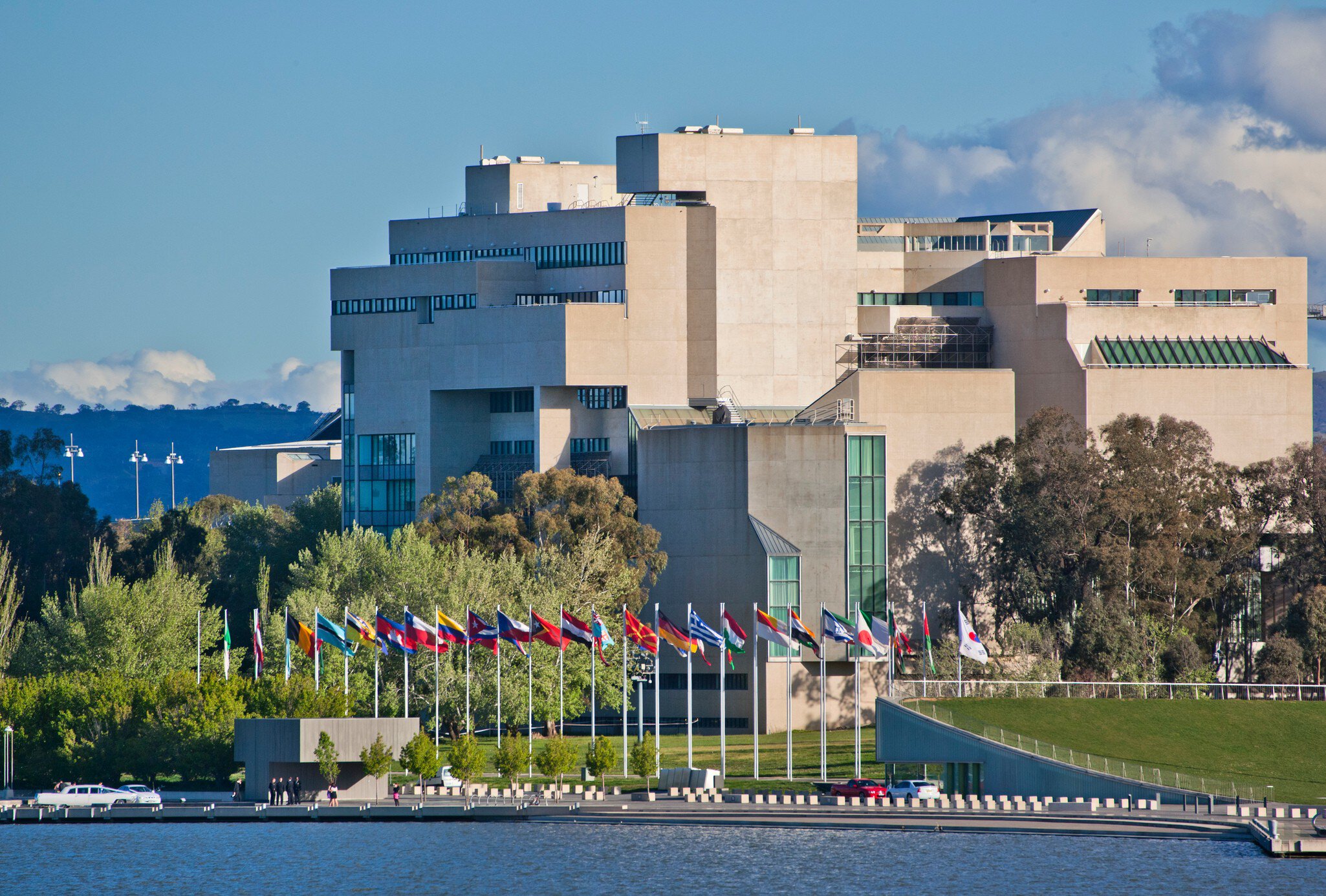 GettyImages-148830038.jpg
Australian National Gallery on the shores of Lake Burley Griffin with international flag display.
